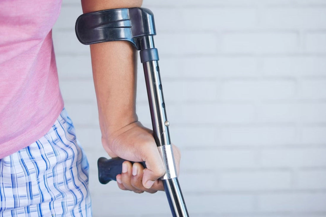 child with crutch