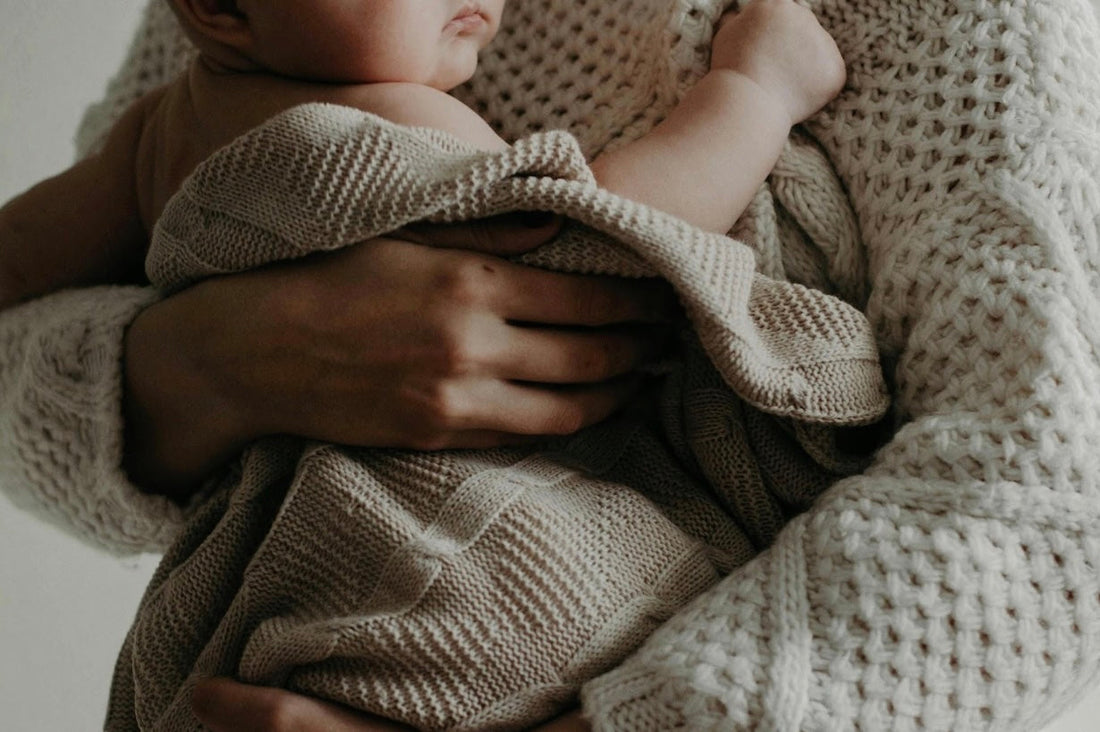 mom and baby in organic baby clothes