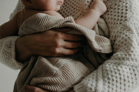 mom and baby in organic baby clothes