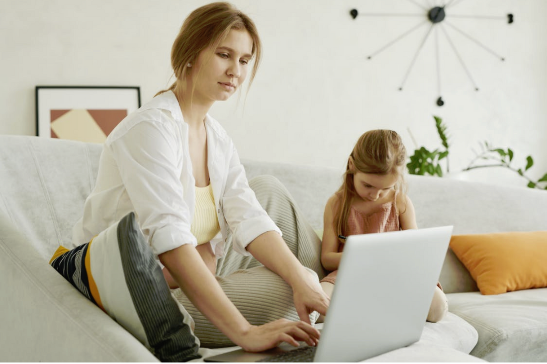 Mom with daughter on computer