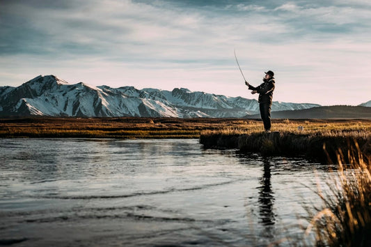 man fly fishing in montana