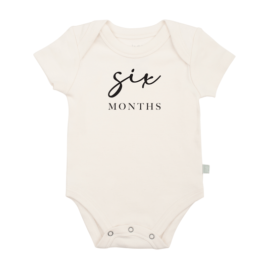 Baby graphic bodysuit | six months milestone black finn + emma